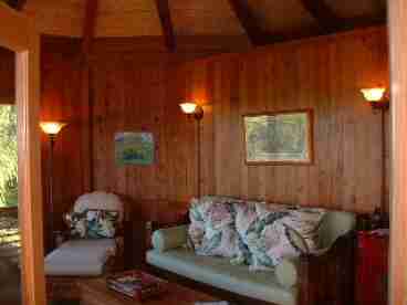 Hand crafted cottage is beautifully and comfortably furnished in tropical motif and features hardwood bamboo floors.  