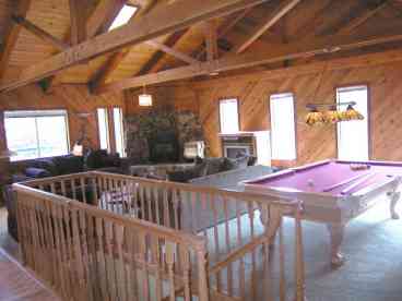Great Room with River Rock Fireplace, Pool Table and Skylights