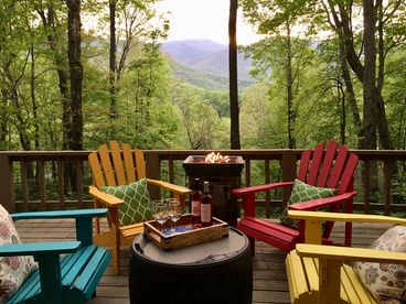 Relax by the firepit with year-round mountain views.