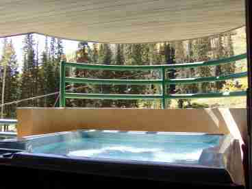 Relax in your own private slopeside jacuzzi after a great day of skiing!
