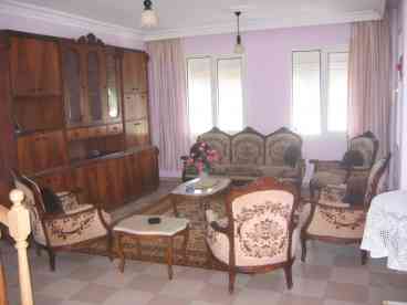 the living room of the villas