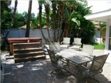 Lush Landscaping Surround The Patio and Jacuzzi Area