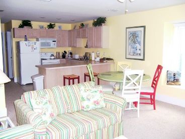 This Barrier Dunes rental is an end unit with a window seat for LOTS of extra light.  Fully stocked kitchen right down to the spices, crab pot and dishwashing detergent.  There is also a gas grill on the back porch!
