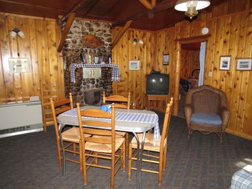 Great Room has knotty cedar walls.