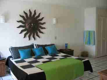 Large master bedroom with its own balcony and view of the Caribbean