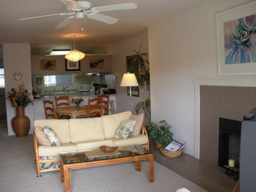 Island style living room with fireplace