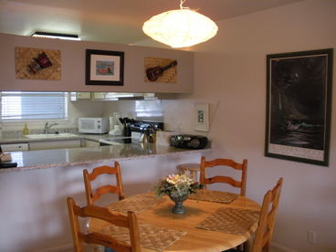 Dining area looking into kitchen