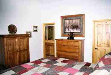 Master Bedroom has king sized bed, walk-in closet, over sized shower, jetted bath tub and views of the Continental divide.