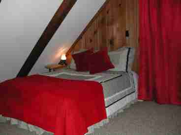 Loft has three beds and a playing area for children
