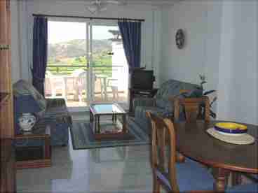 The well furnished lounge/diner leads directly to the lower terrace...the views are superb