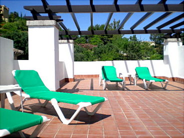 YOur holiday home at Los Arqueros has a huge very private rooftop terrace - here you will find sunbeds ready and waiting!