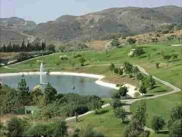 From the terraces your view is of uninterupted green and blue...golf course with lake, mountains with goats and beyond the mediterranean sea meets the sky.