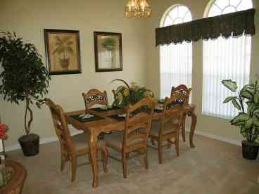The formal dining room has seating for up to six guests. Disney\'s spectacular nightly firework display  \