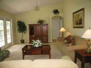 Our family room is large and spacious, with french doors overlooking the swimming pool. A widescreen HDTV with DVD player is available to watch the latest movies along with a Playstation 2 to keep the children entertained. To ensure guests can remain in touch, if they wish, with the outside world Broadband Internet access is provided free as part of the exclusive guest package. A selection of books, games, and DVDs are available for guests use.
