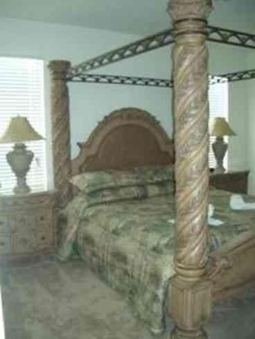 4 Post King Bed fit for a king, suite includes Jacuzzi, separate water closet and shower.