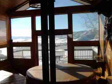 Private Hottub Room with incredible view of the flattop Mountains and Yampa Valley.  Large outside deck is accessible from this room.
