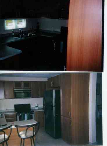 Kitchen with stainless steel appliances. 