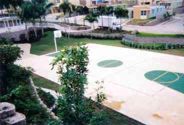 Basketball Court near the front of the house and community.