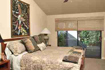 The master suite includes A Californis King bed with Egyptian cotton sheets, a new color TV and a private patio with views of the Santa Rosa mountains.