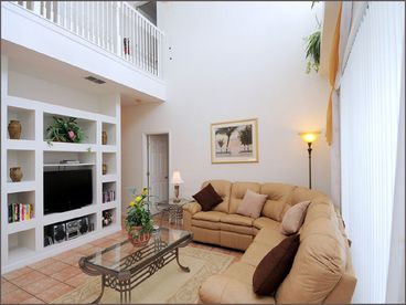 Stylish Family Room with leather reclining chairs and 42\