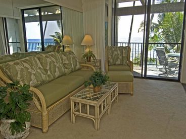Tropically furnished and best of all the beds are not saggy and old - and are very comfortable!  The master bedroom has floor to ceiling windows out to the view.  Go to sleep and wake up to the sounds of the ocean.