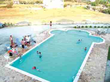 Panoramic view of the swimming pool of Xifoupolis Hotel as seen from the balconies of the first floor.