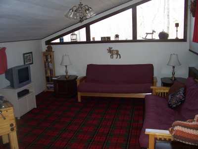 The bright,extra large loft is a great second TV area with plenty of sleeping.  It has a sofabed, futon and state of the art foosball table!