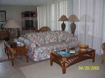 Living Room facing ocean in one bedroom condo.