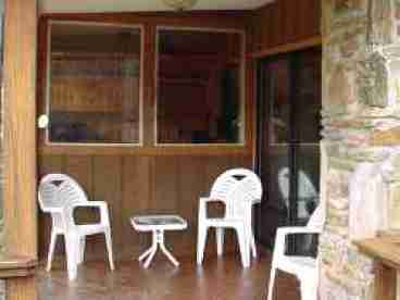 Covered Porch Adjoining Deck and Living Room