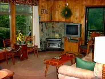 Livingroom Facing Rear Deck And Porch