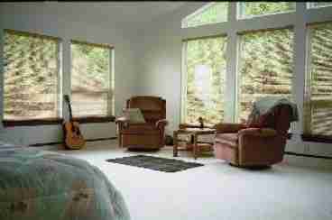 Elegant Master Suite with Cathedral Windows overlooking the bay and Forest Land