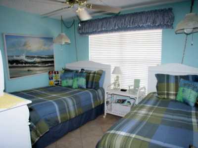 Two full size beds in guest bedroom for total comfort.  Cable TV in bedroom