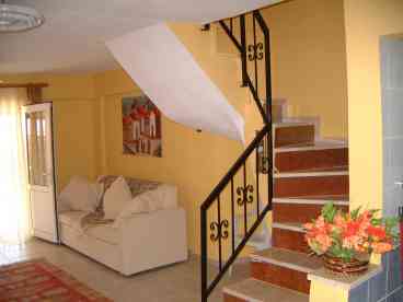 Part of the lounge and stairs