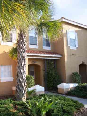 As you drive up to your vaction villa, you will be greeted by warm pastel colors. A very Caribbean feel!