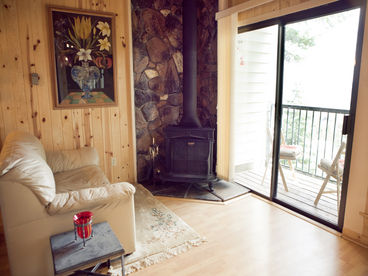 Watch the snowfall and the roaring fire from the living room