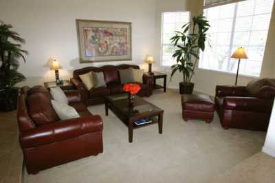 Sit back and relax on our leather sofas in our spacious living room