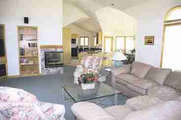 Great Room Looking toward Fireplace and Kitchen and Counter
