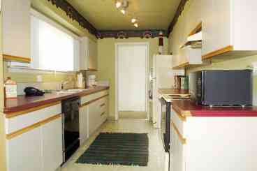 The large Galley Type Kitchen is equipped and ready if you decide to prepare any major meals for your family/group. Unlike some kitchens, two can work in here with out too much trouble.