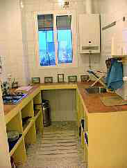 stocked Kitchen with essentials, including sherry wine glasses for afternoon/evening tastings!