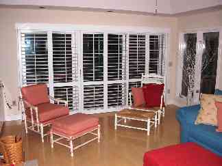 One side of newly furnished and decorated Living Room. Living Room easily accommodates 8 and is well equipped with Cable TV/VCR/DVD/Stereo.  There are videos, games and books provided for your enjoyment.  Our home is also eqipped with Broadband Wireless Internet.
