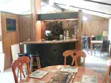 Wet bar with beverage refrigerator.