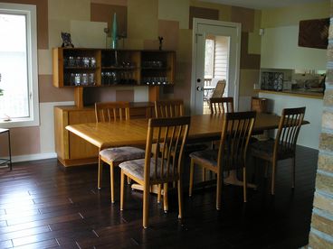 Spacious dining room easily expands to accommodate 10-15 diners.