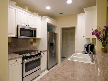 Kitchen comes fully equipped with all stainless, full size appliances.  