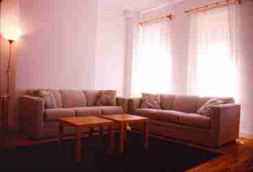 Modern and very bright, with very high celings and a sky light giving extra light to this modern designed studio, a small balcony overlooking the charming towhouses of 74th street and the blooming trees are completing the atmosphere of this cozy Manhattan Studio Apartmetn. Stainless steal library on casters, natural woods, pastel colours and that special Swiss welcome you will never forget.