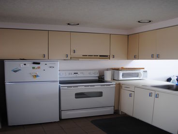 Kitchen stocked with dishes/cups/cutlery etc. Full stove and full refridgerator; not that you will want to cook when you can bbq on the beach!