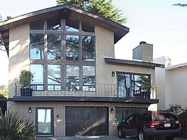 Exterior, 2 car garage with 3 spaces in front. 