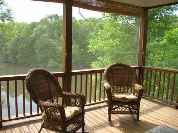 We have a wonderful covered porch with upscale wicker table, couch, several wicker chairs, and two rocking chairs. Perfect 