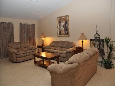 Spacious Family room with 2 full size sofabeds & loveseat - ceramic tile floors 