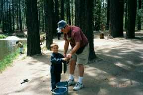 Look at this one. Grandpa and Grandson catching first Fish. Too Cute!!!