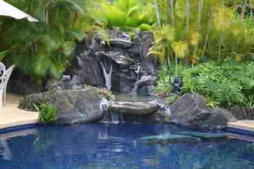 Our beautiful solar heated blue tiled swimming pool.